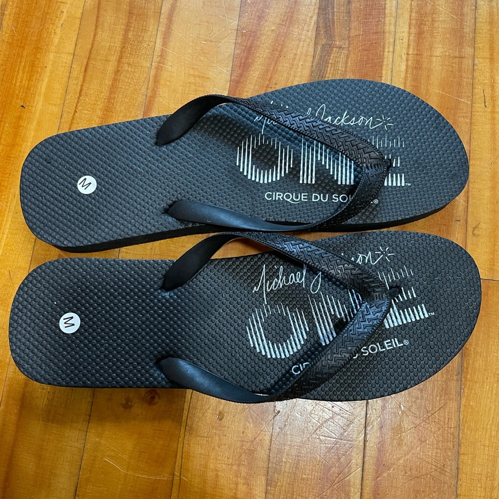Black Cirque du Soleil Flip Flops, Men, size Medium NWOT
